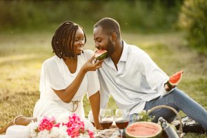 A lady gave a watermelon to a guy showing some simple ways to attract your ex